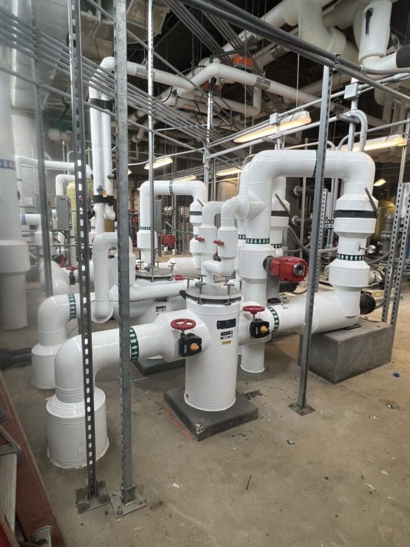 A large room with pipes and valves in it