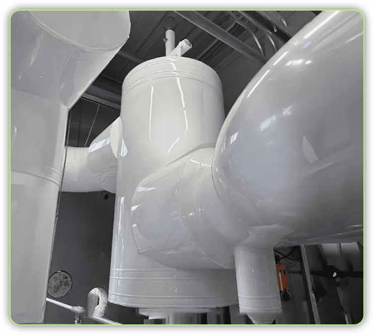 A large white pipe sitting in the middle of a room.