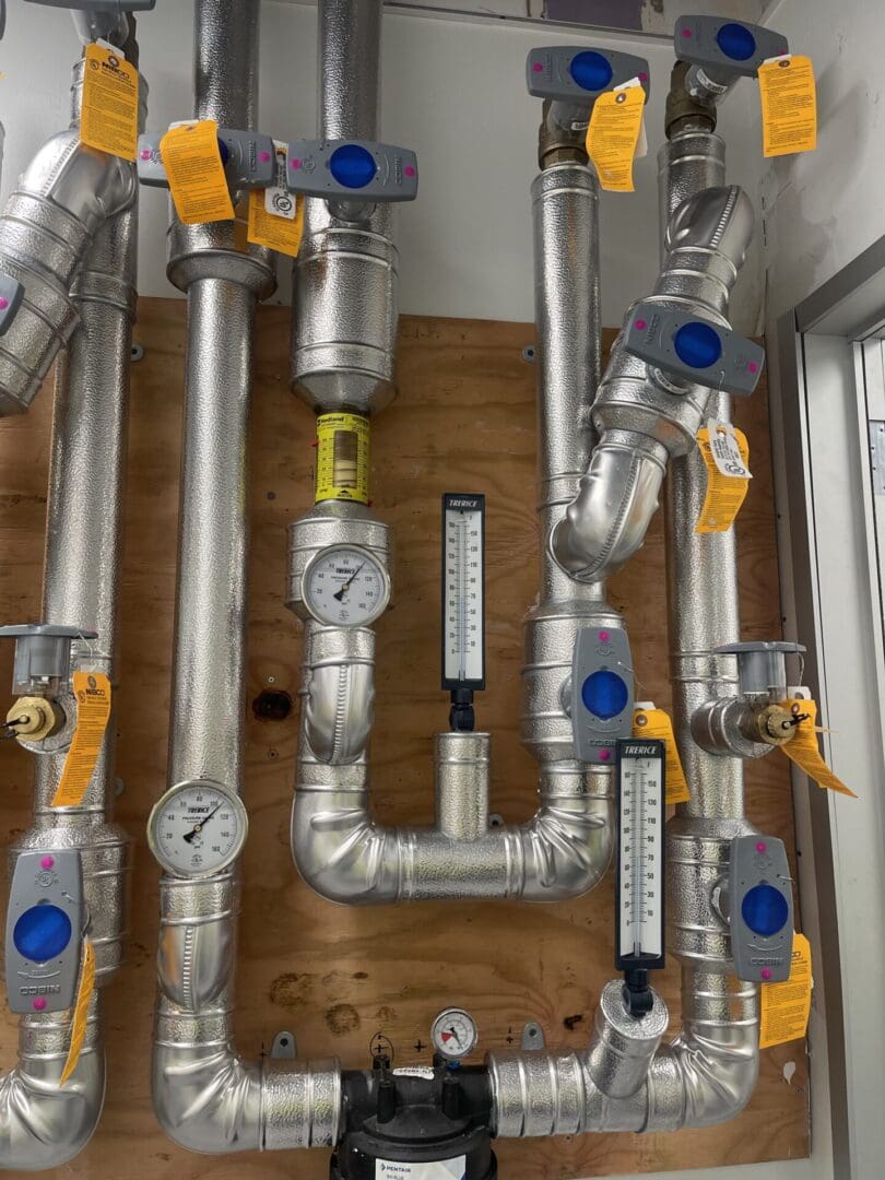 A bunch of pipes that are in the wall