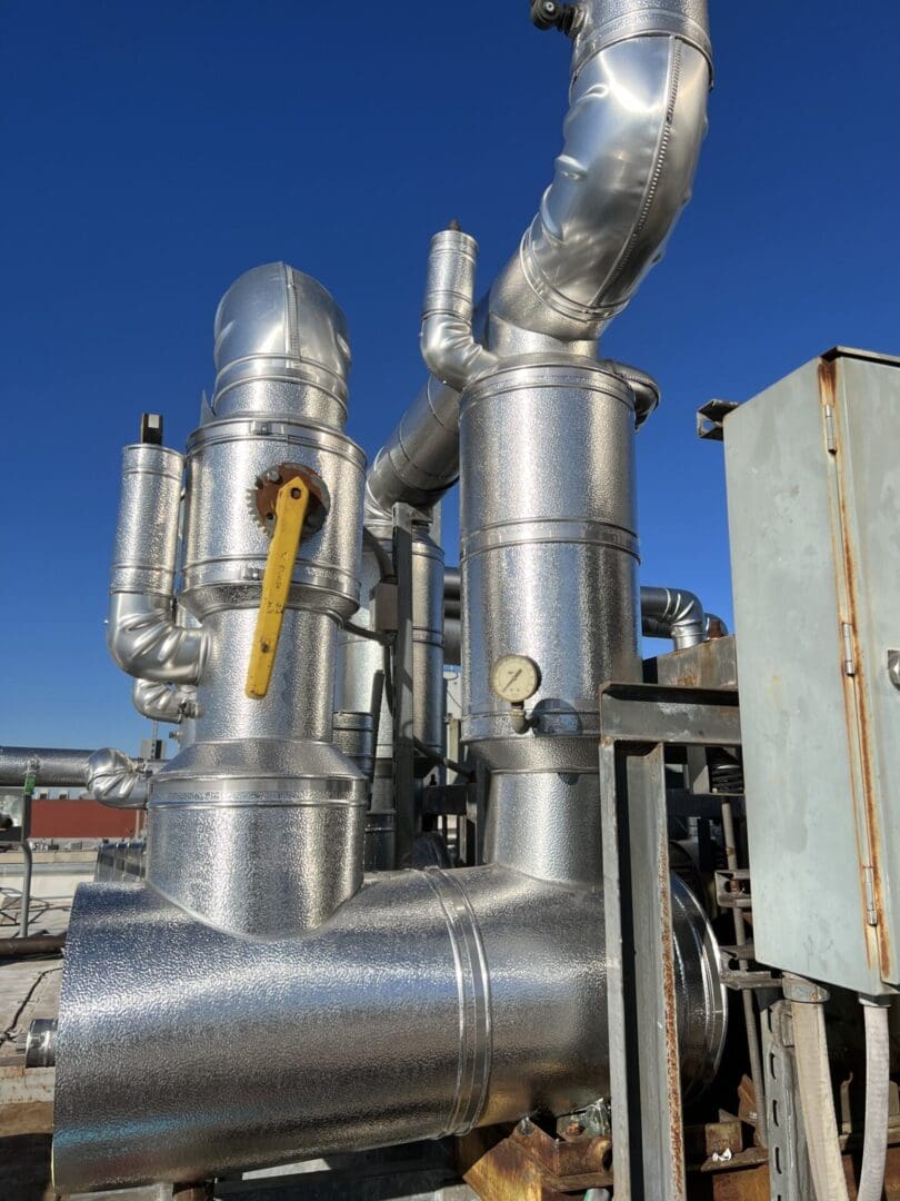 A close up of the pipes on an industrial plant